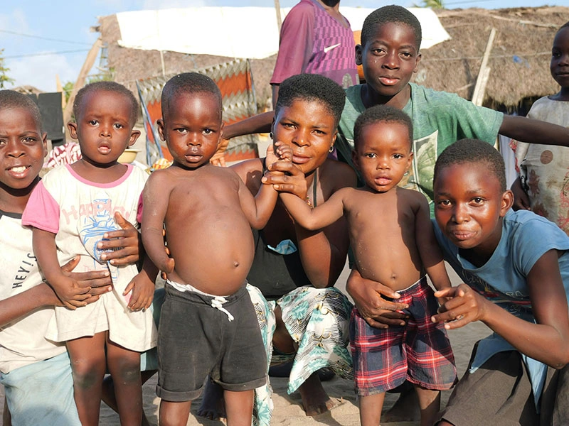 A group of children standing next to each other.