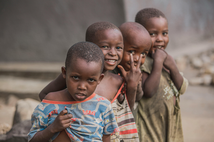 A group of children standing next to each other.