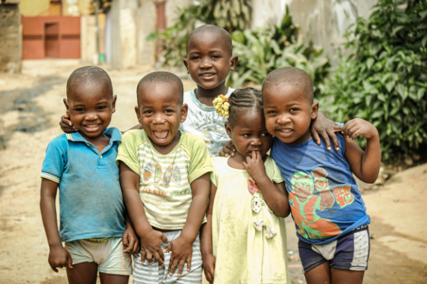 A group of children standing next to each other.