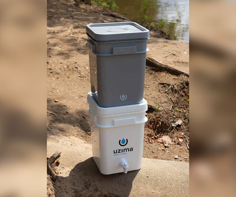 A water container is stacked on top of the ground.