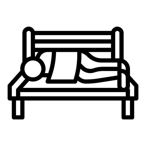 A person laying on top of a bed.