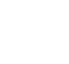 A white television set on top of a green background.